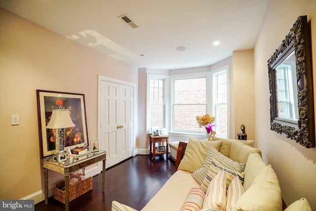 sitting room with visible vents, recessed lighting, baseboards, and dark wood-style flooring