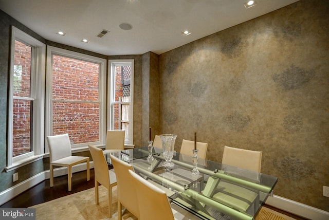 dining space featuring recessed lighting, visible vents, baseboards, and wood finished floors