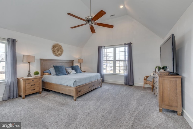 carpeted bedroom featuring multiple windows, visible vents, and baseboards