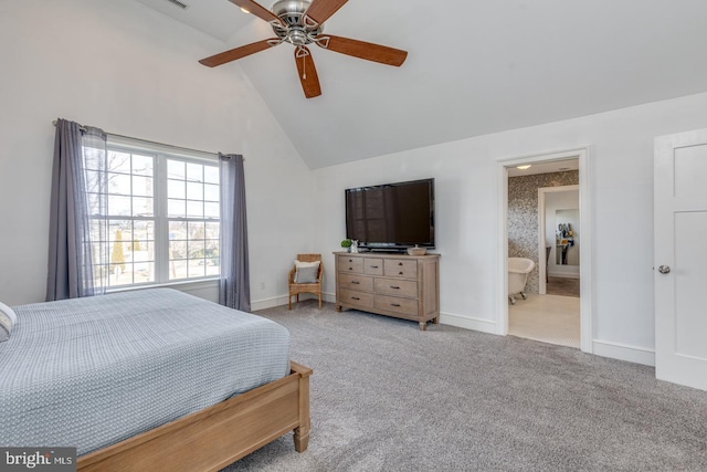 carpeted bedroom with high vaulted ceiling, baseboards, and a ceiling fan