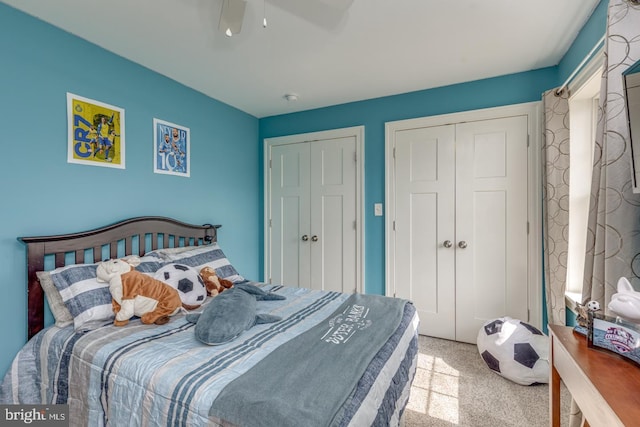 bedroom with a ceiling fan and carpet flooring