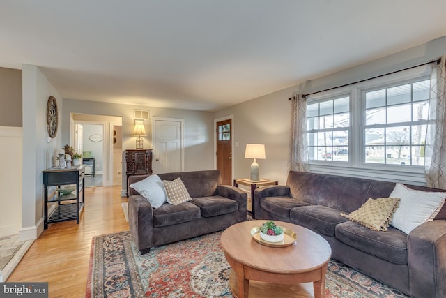 living area featuring light wood-style flooring