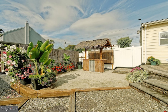 view of yard featuring a patio area and fence