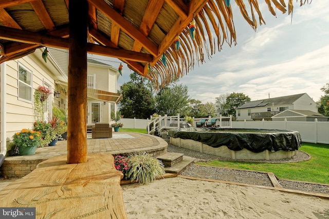 view of yard with a fenced in pool, a patio area, and a fenced backyard