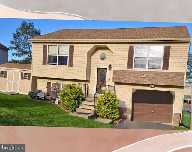 split foyer home featuring a garage, stone siding, an outbuilding, a shed, and a front lawn