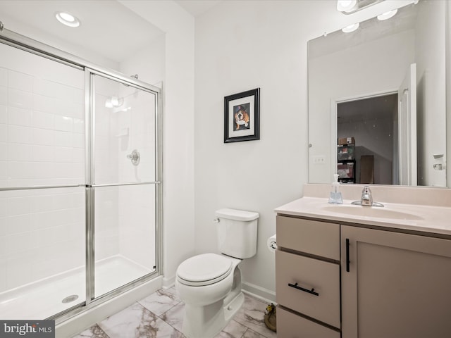 full bath featuring marble finish floor, a stall shower, toilet, and vanity