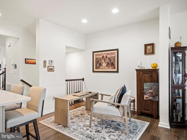 office space with visible vents, recessed lighting, baseboards, and dark wood-style flooring