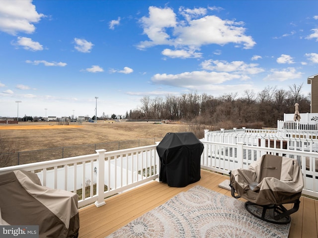 wooden terrace with grilling area