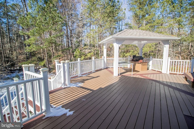 wooden terrace with a gazebo