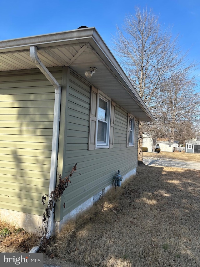 view of home's exterior with crawl space