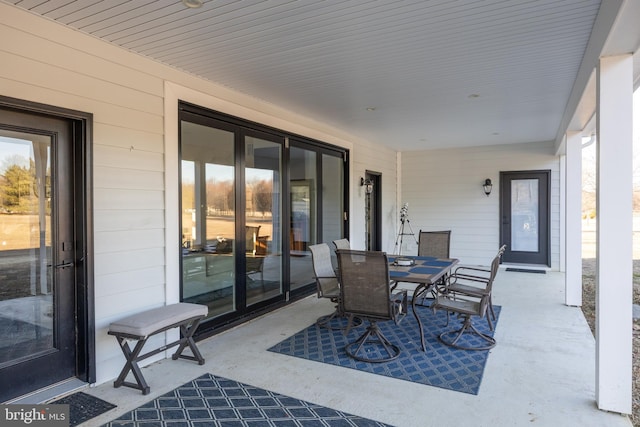 view of patio with outdoor dining area