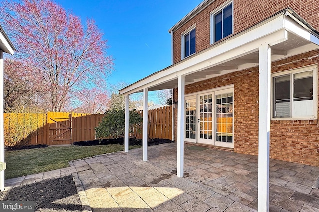 view of patio / terrace featuring a gate and fence