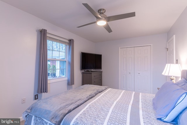 bedroom with a closet and a ceiling fan