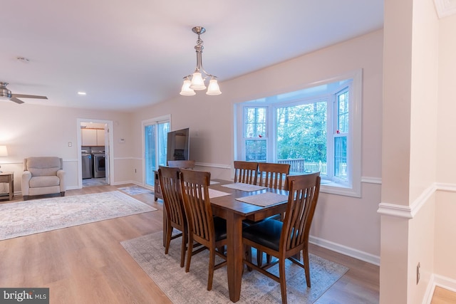 dining room featuring recessed lighting, a ceiling fan, baseboards, light wood-style floors, and washer and dryer