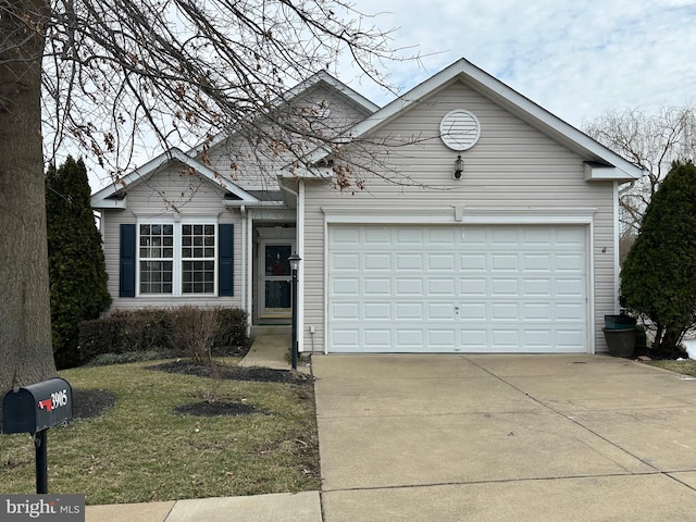 ranch-style house with a front lawn, concrete driveway, and an attached garage