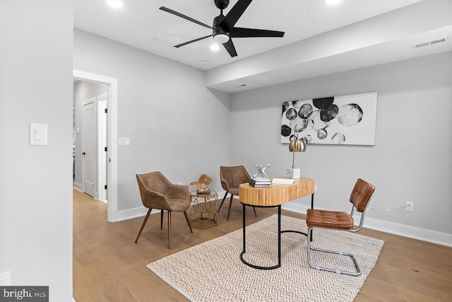 office area with recessed lighting, visible vents, baseboards, and wood finished floors