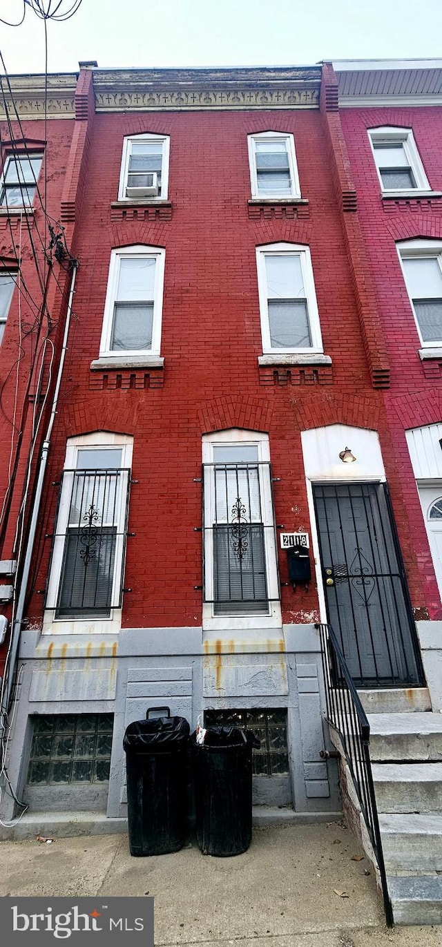 view of building exterior with entry steps