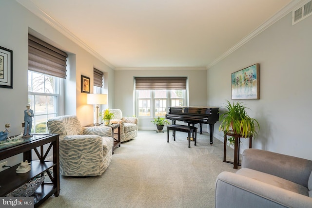 living area with baseboards, carpet floors, visible vents, and crown molding