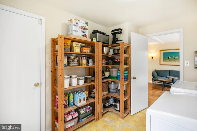 pantry featuring washing machine and dryer