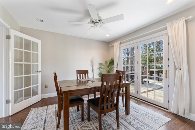 dining room featuring baseboards, ceiling fan, wood finished floors, french doors, and recessed lighting