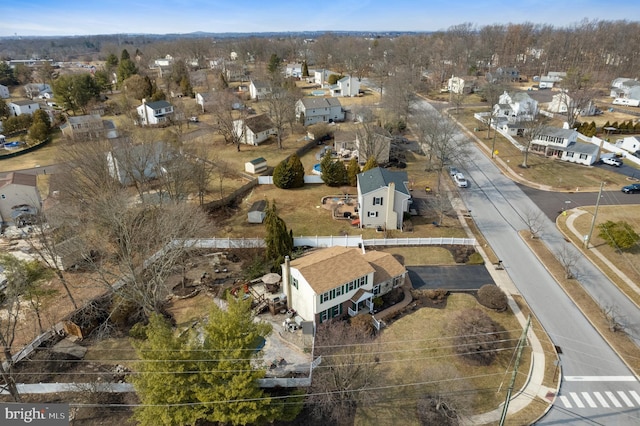 birds eye view of property with a residential view