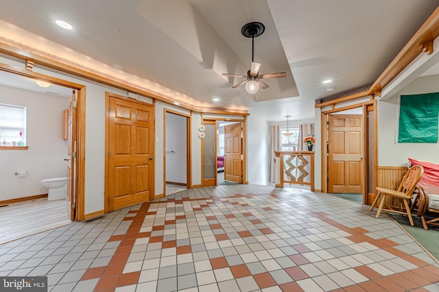 foyer featuring light tile patterned floors, baseboards, a ceiling fan, and recessed lighting