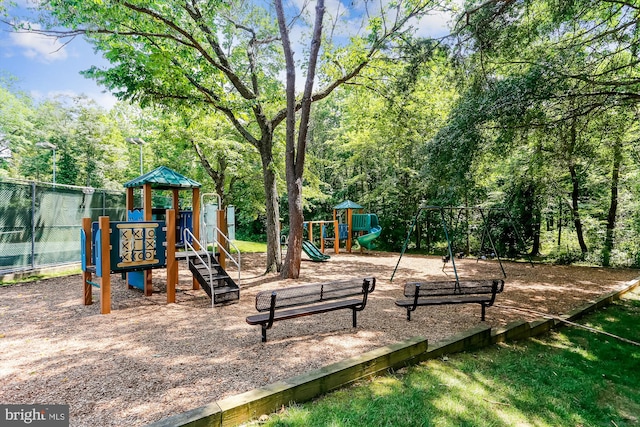 community playground featuring fence