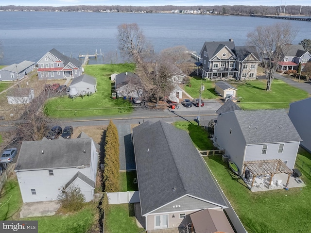 aerial view featuring a residential view and a water view