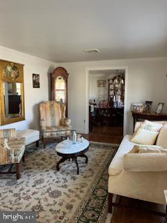 112 Mitchell St, Saint Michaels, MD 21663 - living room featuring dark wood-style floors