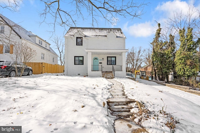 view of front of house featuring crawl space, a residential view, and fence