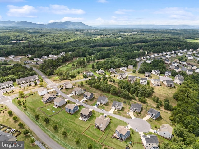 birds eye view of property with a residential view and a mountain view