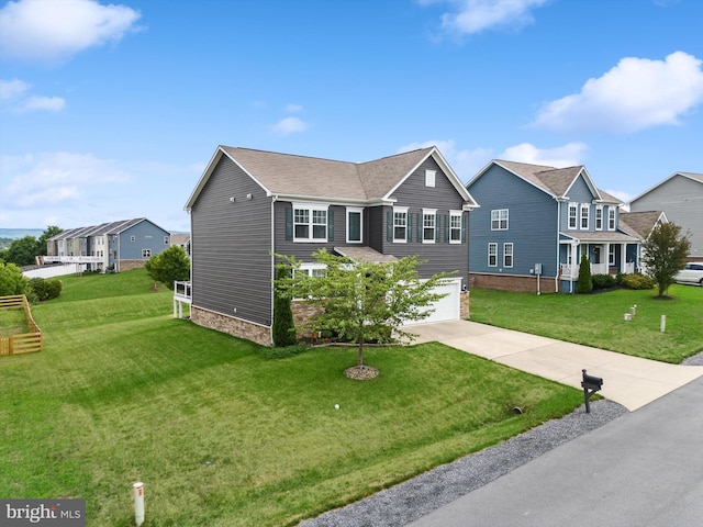 traditional-style home with concrete driveway, an attached garage, and a front yard