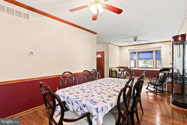 20 Glade Ave, Baltimore, MD 21236 - dining room featuring a ceiling fan, hardwood / wood-style floors, crown molding, and baseboards