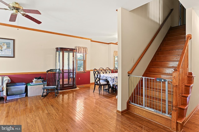 20 Glade Ave, Baltimore, MD 21236 - stairs featuring ceiling fan, wood finished floors, baseboards, and crown molding