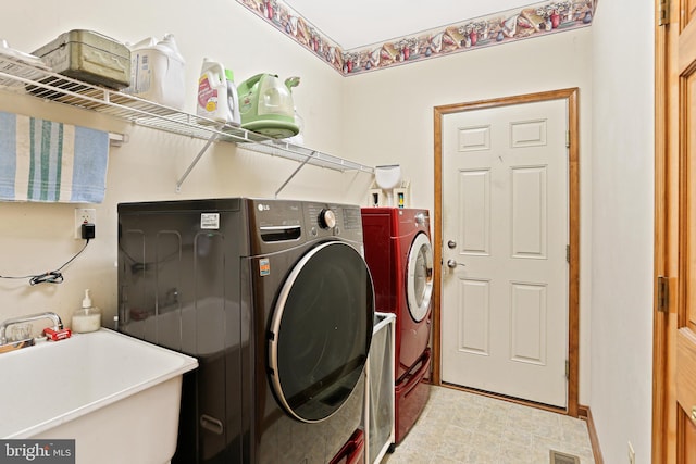 20 Glade Ave, Baltimore, MD 21236 - laundry room featuring washing machine and dryer