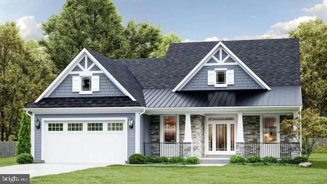 view of front of home with metal roof, a porch, stone siding, concrete driveway, and a standing seam roof