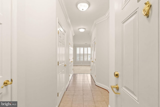 8610 Liberty Trl Unit 102, Manassas, VA 20110 - corridor with light tile patterned floors, baseboards, and crown molding
