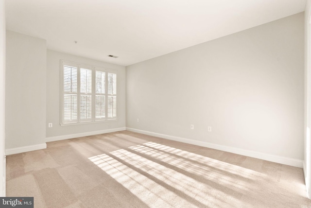 8610 Liberty Trl Unit 102, Manassas, VA 20110 - unfurnished room featuring visible vents, light carpet, and baseboards