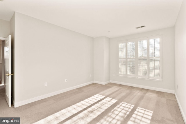 8610 Liberty Trl Unit 102, Manassas, VA 20110 - carpeted empty room with baseboards and visible vents