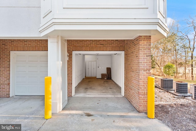 8610 Liberty Trl Unit 102, Manassas, VA 20110 - exterior space featuring brick siding and central air condition unit
