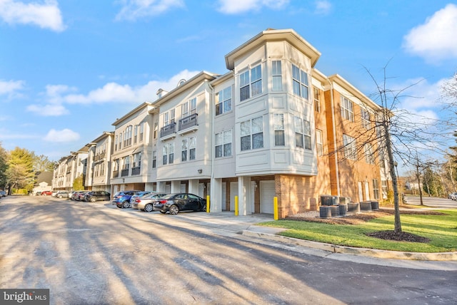 8610 Liberty Trl Unit 102, Manassas, VA 20110 - view of building exterior with cooling unit and central AC