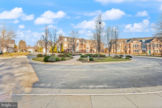 8610 Liberty Trl Unit 102, Manassas, VA 20110 - exterior space featuring curbs and a residential view
