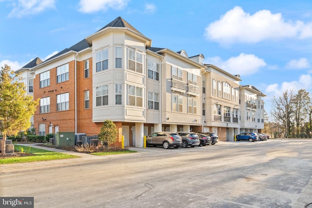 8610 Liberty Trl Unit 102, Manassas, VA 20110 - view of property with central air condition unit
