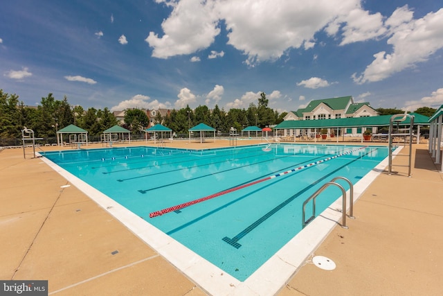 community pool with a gazebo