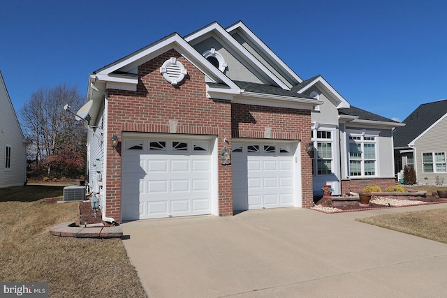 view of front of property with a garage, driveway, brick siding, and central air condition unit