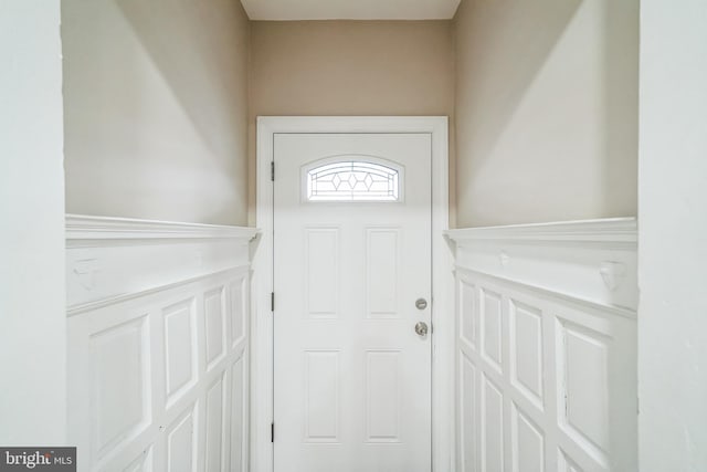 entryway featuring wainscoting