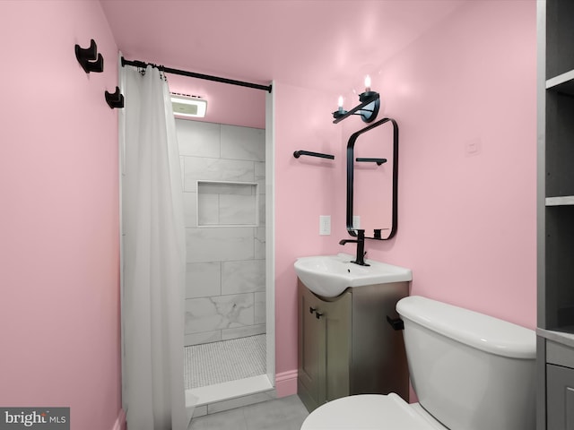 full bath with a shower stall, marble finish floor, toilet, and vanity