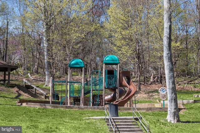 communal playground with a lawn