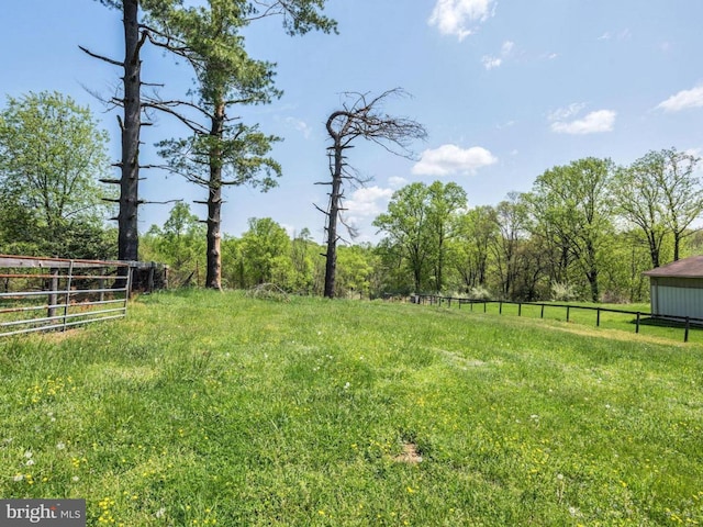 view of yard with fence