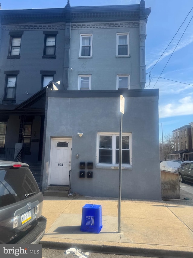 view of front of house featuring stucco siding